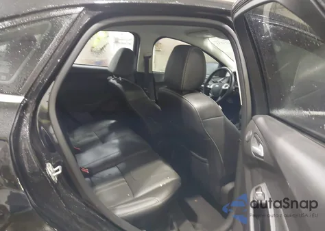 2014 Ford Focus Titanium из США, поврежденный, VIN 1FADP3J27EL148933